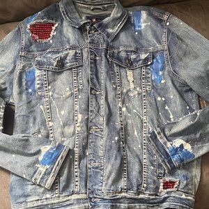 Distressed Denim Jacket with Red and Blue Accents